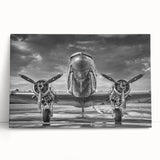 Black and white photograph of a vintage airplane on stretched canvas, ideal for kitchen wall art or bedroom ambiance.