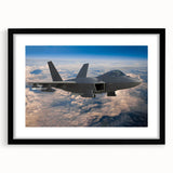 Abstract art print of an airplane in muted gray and black tones on a framed canvas.
