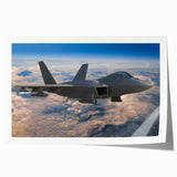 Art deco poster of an airplane in flight, featuring bold black and gold colors, on rolled print.