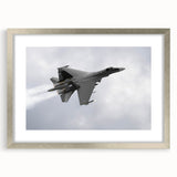 Textured abstract art print of airplanes in neutral and blue tones on a framed silver mat, ideal for bedroom art.