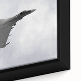 Extra large framed canvas featuring a black airplane silhouette with a colorful, textured background.