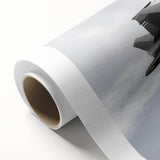 Art deco style airplane illustration in bold black and gold tones on a rolled canvas, suitable for nursery wall art.