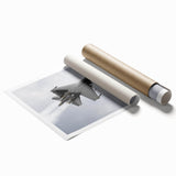 An abstract airplane design in muted gray and white tones on a rolled canvas, suitable for art wall dining room.