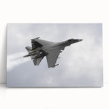 Black and white photograph of an airplane in flight on stretched canvas, suitable as kitchen wall art or for a bedroom.