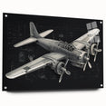 Side view of an airplane depicted in large abstract wall art on acrylic glass, featuring cool gray and metallic hues.