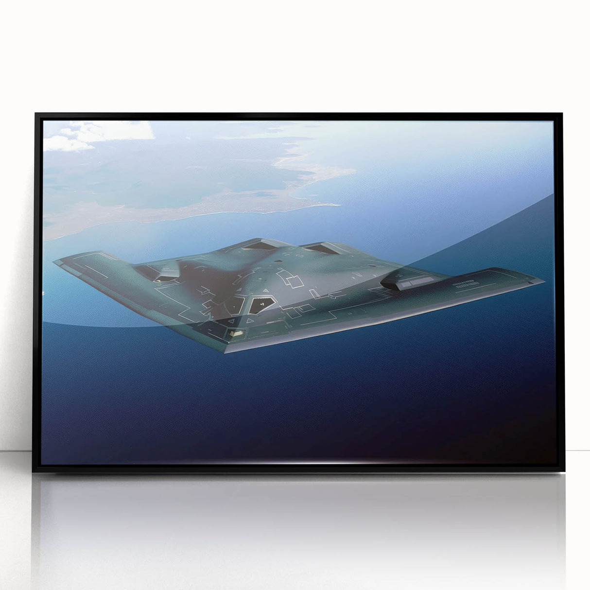 Mid-century modernist large abstract airplane design in muted gray and black tones on a framed acrylic.