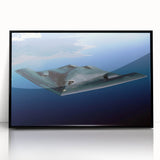 Mid-century modernist large abstract airplane design in muted gray and black tones on a framed acrylic.