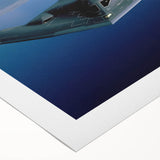 Art deco poster of a vintage airplane in muted silver and blue tones, ideal for dining room wall art.