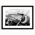 Extra large abstract art print of a colorful airplane, textured design on black-framed canvas, ideal for living room decor.