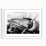 Abstract airplane design in deep blue and gray tones on a large canvas, ideal for living room décor.