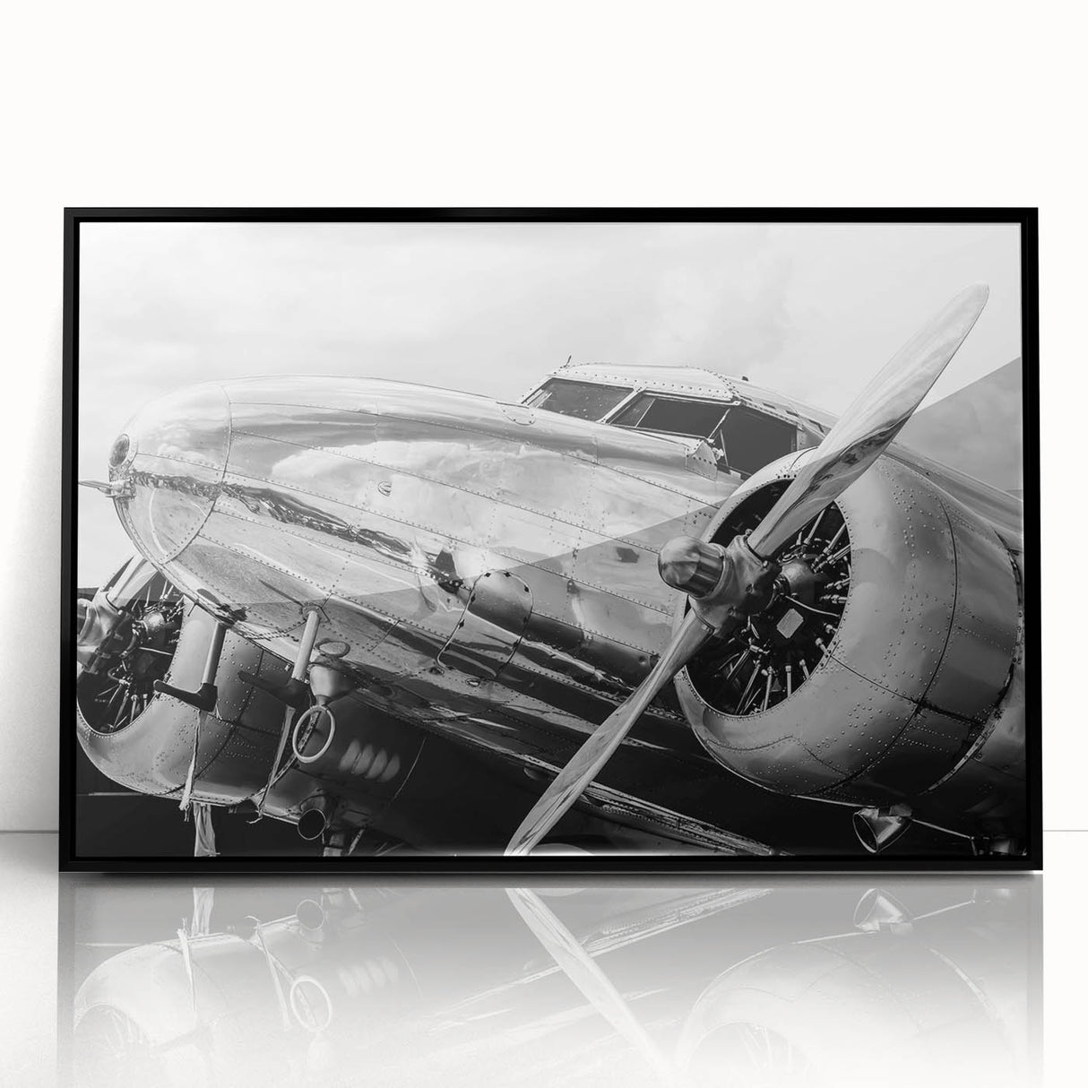 Large abstract wall art featuring airplanes in mid-century modernist style, framed in black acrylic.