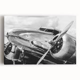 Black and white photo of an airplane on stretched canvas, suitable for kitchen wall art in a large format.