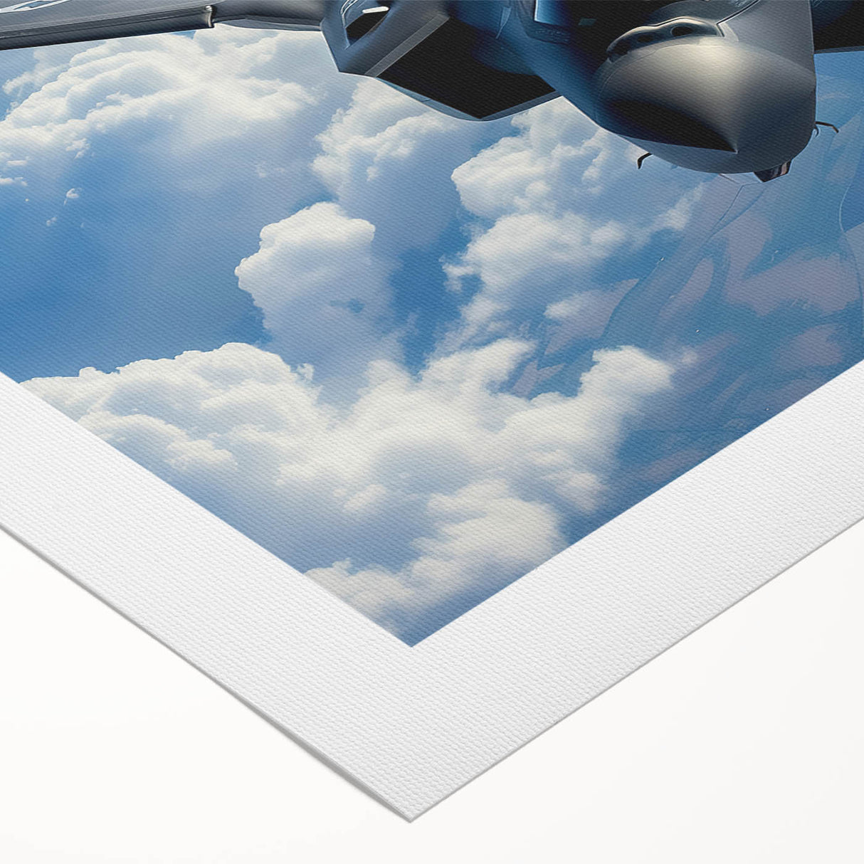 Art deco poster of an airplane in flight, featuring bold geometric shapes in blue and silver, on rolled canvas.