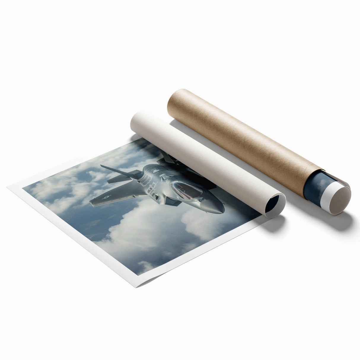Extra large rolled print of an airplane in flight over a cloud-filled sky, in soft gray and blue tones.