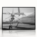 Mid-century modernist large abstract wall art featuring colorful airplanes, acrylic print in black frame.