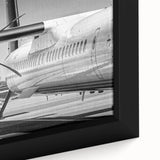 Extra large black wall art featuring a colorful, textured airplane design on framed canvas, ideal for living room decor.