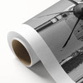 Art deco poster of a vintage airplane, in muted silver and blue tones, on rolled canvas, ideal for nursery wall art.