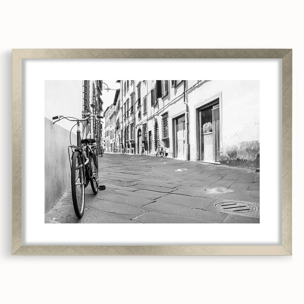 Textured art print of an abstract bicycle in silver and gray tones on a framed canvas, suitable for bedroom decor.