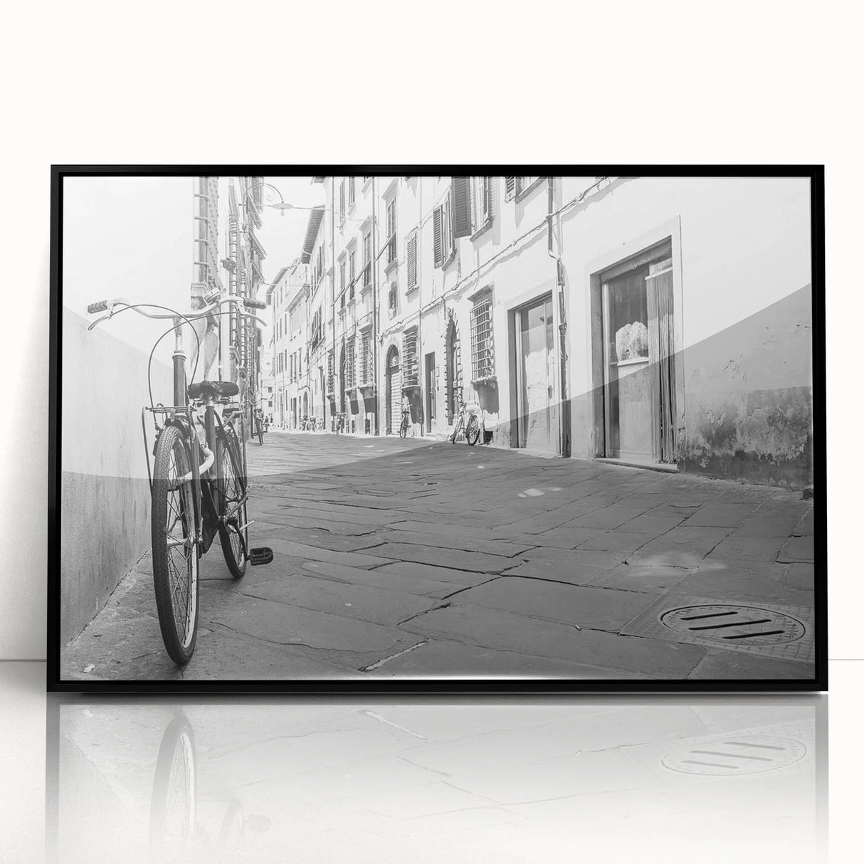 Large abstract wall art featuring a stylized bicycle in black and white tones, framed in acrylic.