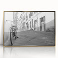 Mid-century modernist art of a bicycle in muted earth tones on a gold-framed acrylic, ideal for nursery wall art.