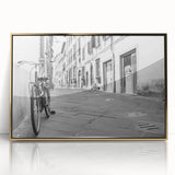 Mid-century modernist art of a bicycle in muted earth tones on a gold-framed acrylic, ideal for nursery wall art.