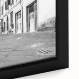 Framed canvas featuring a textured close-up of a black bicycle, accented with colorful art elements.