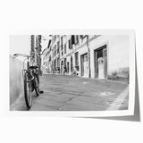 Rolled print of a vintage bicycle with floral accents in pastel colors, ideal for art wall dining room decor.