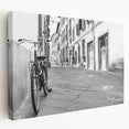 Side view of a vintage bicycle print on stretched canvas, featuring muted earth tones, ideal for kitchen wall art.
