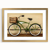 Abstract art print of a bicycle in gold and black tones on a framed canvas, suitable for dining room or bedroom decor.