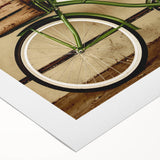 Art deco poster featuring a vintage bicycle, rendered in muted earth tones on rolled canvas, suitable for dining room decor.