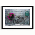 Extra large abstract art print featuring a colorful, textured depiction of a bicycle on a black framed canvas.