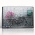Large abstract wall art depicting a bicycle, in muted earth tones on acrylic, framed in black.