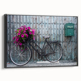 Black and white vintage poster art of a bicycle on a framed canvas, ideal for bedroom wall decor.
