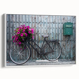 Vintage poster art of a colorful bicycle on a black background, framed canvas, ideal for living room decor.