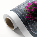 Art deco style bicycle illustration in muted pastel colors on rolled canvas, suitable as nursery wall art.