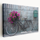 Side view of a vintage bicycle print on stretched canvas with muted earth tones, suitable for kitchen wall art.