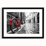 Extra large abstract art print featuring a colorful, textured depiction of bicycles on a black framed canvas.