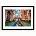 Abstract art print of a bicycle in vibrant colors on a textured canvas, framed in black, ideal for living room decor.