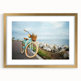 Abstract art print of a stylized bicycle in gold and black tones on a framed canvas, suitable for dining room decor.