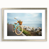 Textured abstract art print of a bicycle in muted gray tones on a silver-framed canvas, suitable for bedroom decor.