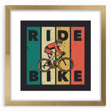 Abstract art print of a stylized bicycle in gold and black hues, framed with a mat.