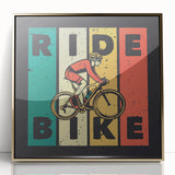 Art Deco style poster of a vintage bicycle in bold black and gold tones, acrylic print framed in gold.
