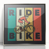 Mid-century modernist art depicting a bicycle in silver and black tones, acrylic print framed.