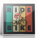Mid-century modernist art of a bicycle in muted earth tones on a white acrylic framed print, suitable for nursery wall decor.