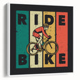 Framed canvas featuring a vintage black bicycle on a white background, ideal for bedroom wall art.
