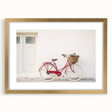 Textured abstract art print of a bicycle in gold and black, framed with mat, ideal for bedroom decor.