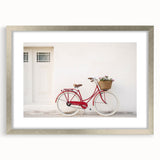 Abstract art print of a bicycle in muted gray and blue tones on a silver-framed canvas, ideal for dining room decor.