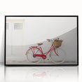 Framed acrylic print of a bicycle in black and white, suited for bedroom or dining room decor.