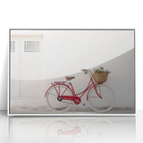Large abstract wall art featuring a bicycle in bold black outlines on a white acrylic framed print.