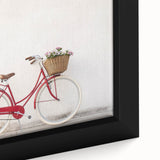 Close-up of extra-large framed canvas featuring a black bicycle on a colorful, textured background.